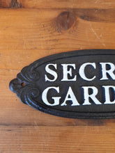 Load image into Gallery viewer, secret garden cast iron sign
