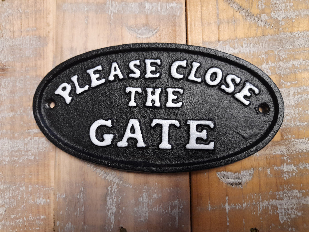 Cast iron sign 'PLEASE CLOSE THE GATE'