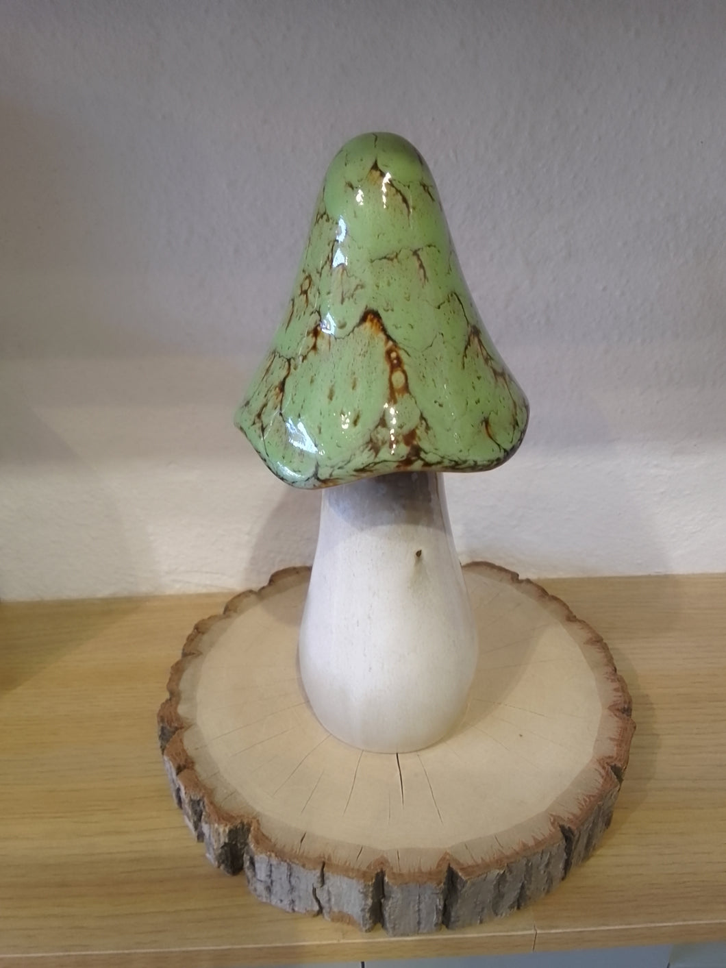 Tall large ceramic mushroom in green