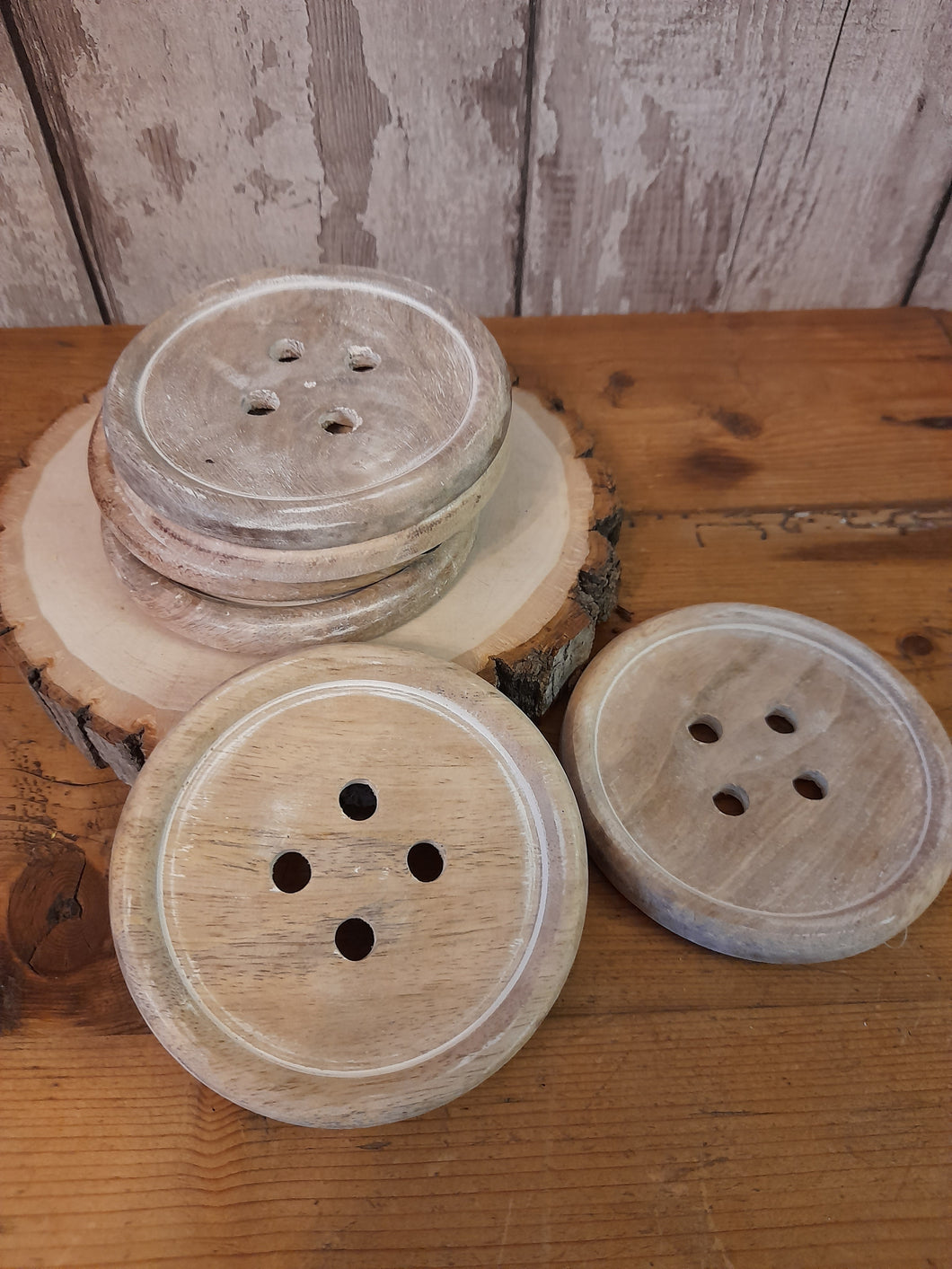 button shaped wooden coasters