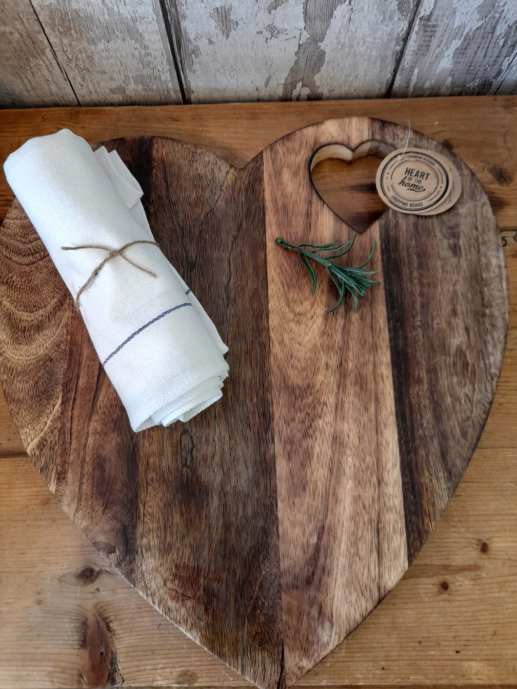 Heart shaped natural wooden chopping board
